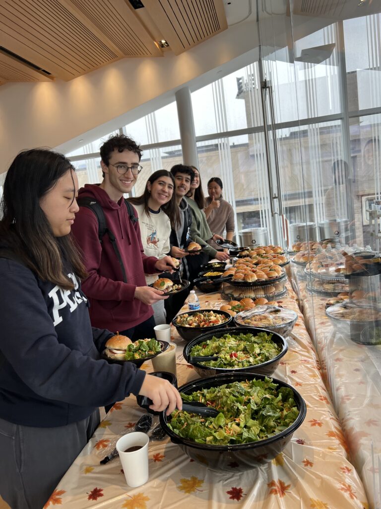 Penn MSE students enjoying the holiday fare Image 1