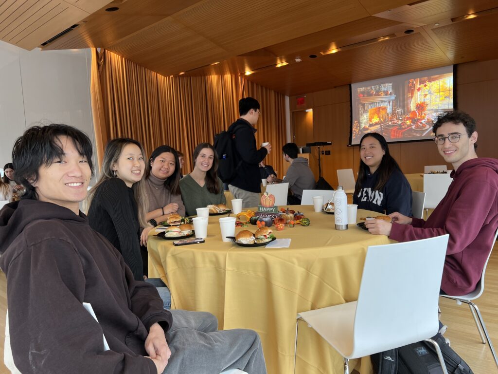 Penn MSE students enjoying the holiday fare Image #3